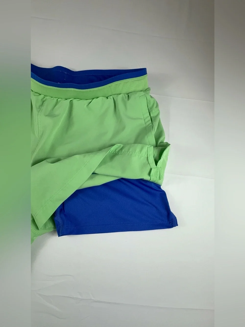 Fabletics Bright Blue Shorts with Lime Drawstring